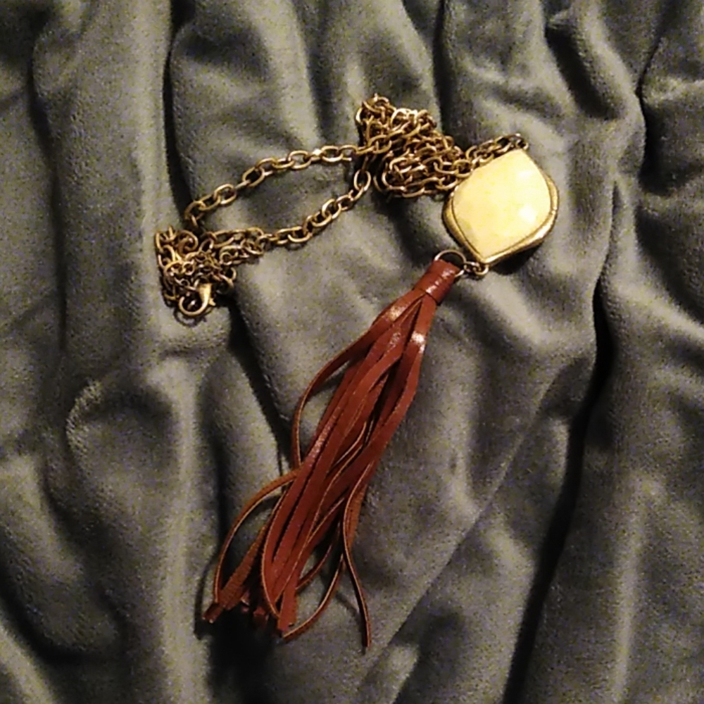Long gold necklace